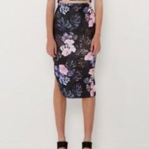 The fifth. Below the knee skirt with side slit, S